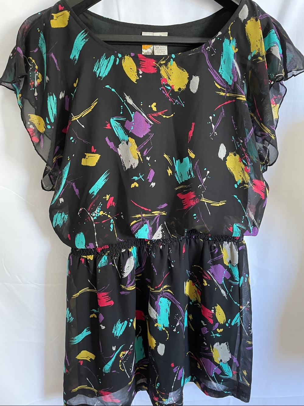 Blouson-Style Sleeveless Mini Dress by Mimi Chica.